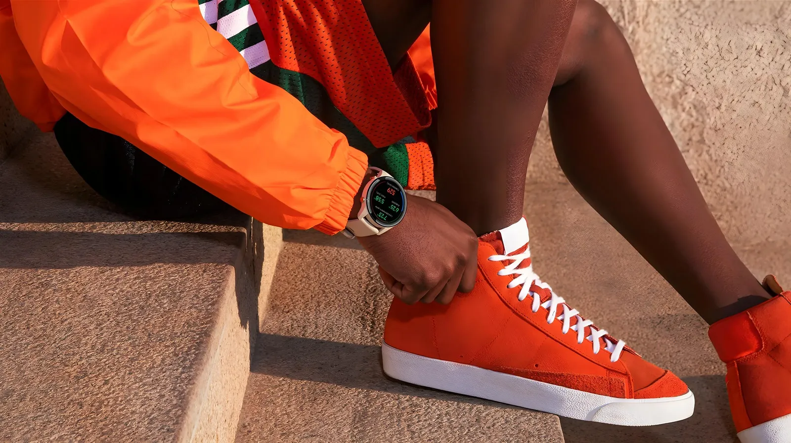 man skating with neon background